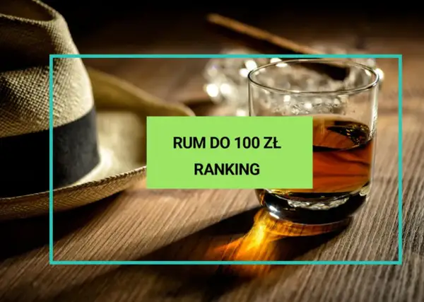 Słomkowy kapelusz i szklanka z bursztynowym płynem. Ranking najlepszego polskiego rumu do 100 zł.